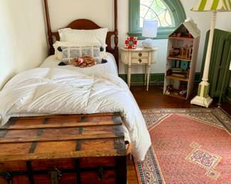 Twin bed, new bedding, dreamy antique rug, dollhouse - complete with furniture and old trunks, steamers and boxes galore