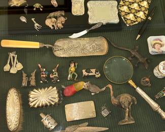 case with some sterling smalls, Austrian bronze miniatures, Versace limited edition necktie...