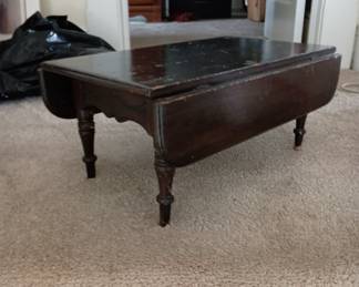Looks to be a Salesman's Sample of a drop leaf table, 