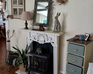 Faux fireplace mantle, with heater insert
Five drawer storage cabinet 
