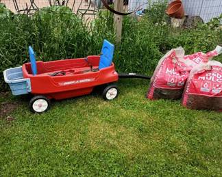 Radio flyer wagon
Red mulch 