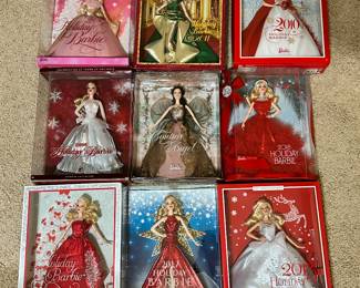 New in box Holiday Barbies