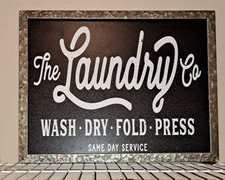 Metal laundry sign