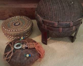 Several vintage sewing baskets