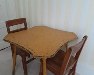Vintage table with childrens chairs