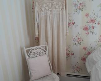 Vintage gown with white wicker chair