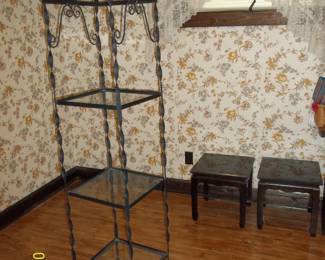 2 small tables have marble tops, another wrought iron shelf unit