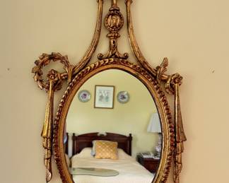 Ornate Gilt Wood Mirror. Measures 48" x 24". Photo 1 of 2. 