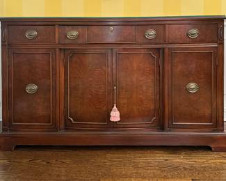 Vintage Flame Mahogany Sideboard with Brass Pulls. Measures 60" W x 19" D x 36" H. Photo 1 of 4.