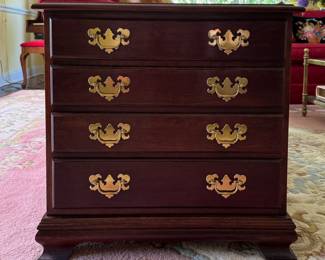 Mahogany-Finish Chest of Drawers. Measures 24" W x 14" D x 24" H. Photo 1 of 3. 