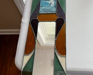 Mirrored glass piece