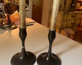 Signed Eva Seizel bronze candle sticks.