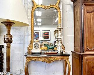 Carved gilt wood console with mirror
