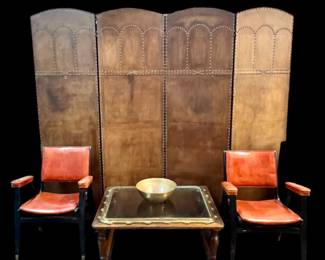Four panel leather screen, MCM chairs, coffee table made from window of the SS Sangay - WWII munitions ship