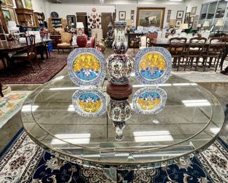 Mirrored table with Murano apron accents; Bjorn Winblaad plates and Delft polychrome vase