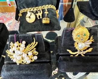 Imagine these pins on a navy blazer and the charm bracelet on your wrist. You will stand out and be noticed for your taste in fine jewelry!