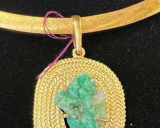 Raw emerald pendant