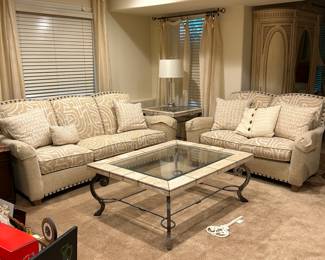 Living room set.  three seat sofa plus love seat and coffee table with iron legs