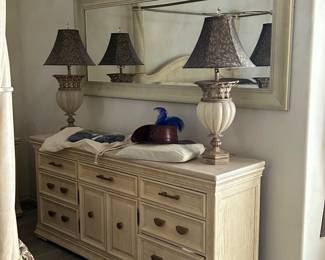 triple dresser with mirror and lamps