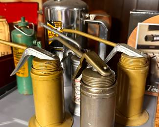 The range of items in this sale is staggering! Here is a shelf filled with oil cans! MORE IN THE GARAGE TOO! 