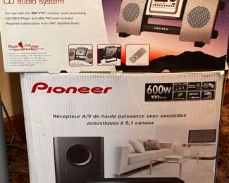 The Delphi stereo was NEVER opened! The Pioneer System is MINT and only the receiver was out of the box!