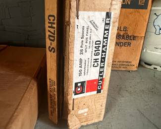 This entire table is filled with electrical gear! Fuse Boxes, plus, switches, holders, pipes... Also a pair of Propane tanks! The Table is for sale too! 