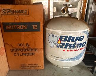 This entire table is filled with electrical gear! Fuse Boxes, plus, switches, holders, pipes... Also a pair of Propane tanks! The Table is for sale too! 