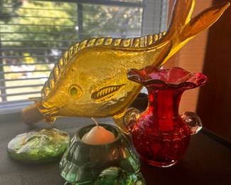 Some lovely colored glass! The biggest piece is a MCM Blenko Orvieto Art Glass Fish Decanter! The small cranberry vase is also MCM and beautiful! 