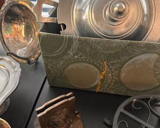 Lots of metalware! Love the solid brass LION books ends in the middle of the table! 