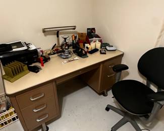 The excellent steel office desk and chair! Filled with more office supplies etc...