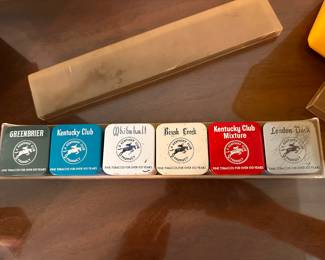 Two sets of vintage TOBACCO TINS! Each is roughly 2.5 x 2.5 inches! All are in excellent shape and come in the original  plastic container! 