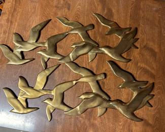 A pair of lovely brass wall hangings!