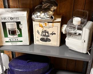 One of MANY display racks filled with new unopened  and gently used small kitchen appliances and accessories! 