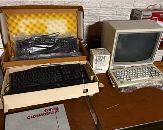 A MINT Dell Keyboard and a Vintage IBM computer with keyboards! 