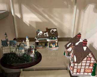 Various Christmas village buildings