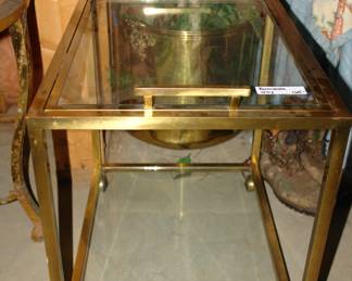 Glass serving table on wheels with removable tray