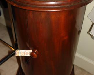 Round cabinet with marble top