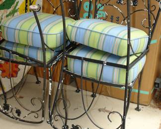 Metal porch chairs with upholstered cushions