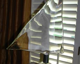 Art glass sculpture of sail and ocean wave