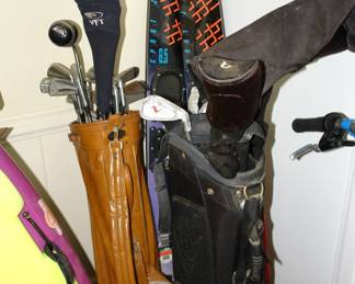 Golf clubs and water skis