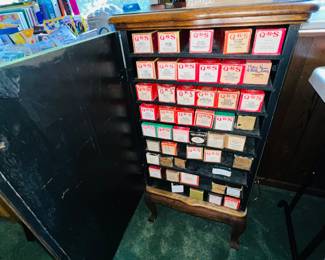 Antique scroll cabinet