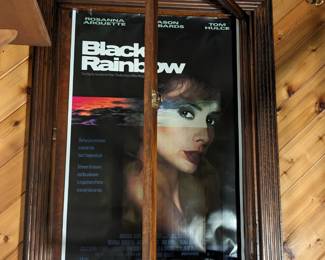 Lot 100: Advertising movie poster for Black Rainbow featuring Rosanna Arquette, Jason Robards and Tom Holtz, wooden case reads Double Feature and has single door on hinges measures 54 " high x 37.5 " wide