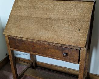 Lot 212: Fall front oak desk featuring one drawer, fitted interior; measures 41 " high x 29 " wide x 18 " deep