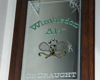 Lot 101: Wimbledon Ale on Draught advertising mirror with frame measuring 36 " high x 25 " wide