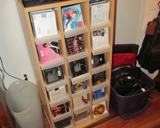 We have a tower of CDs and DVDs. 