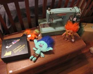 Kingston sewing machine, cute trolls, and a professional domino set