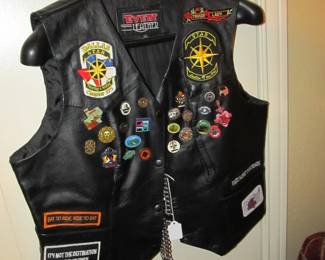 We have a total of 4 biker vests decked out in patches and pins. very cool!