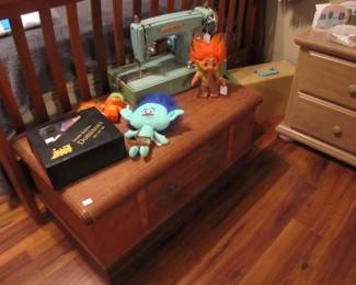 antique cedar chest, perfect size. Vintage Kingston sewing machine and fun troll dolls.