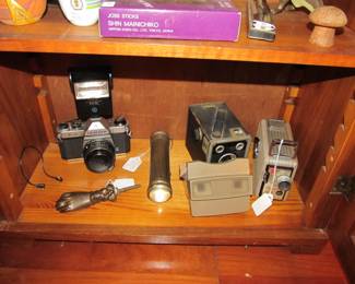 Antique 1920s flashlight, Pentax camera, Viewmaster, Antique brownie cameras