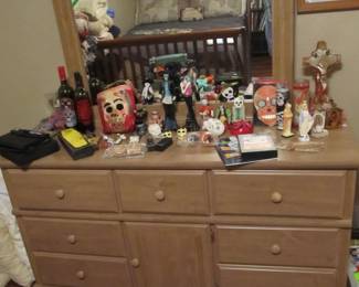 Nice dresser, mirror, and nightstand. Day of the Dead decor